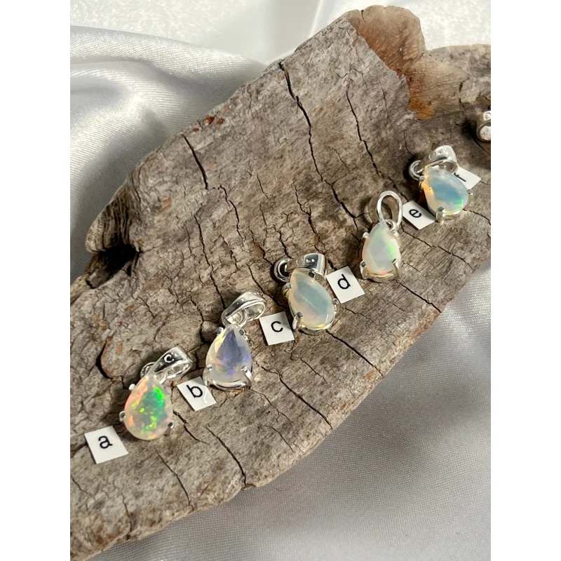 Dainty Prong Set Facet Cut Teardrop Shaped Ethiopian Opal Pendant