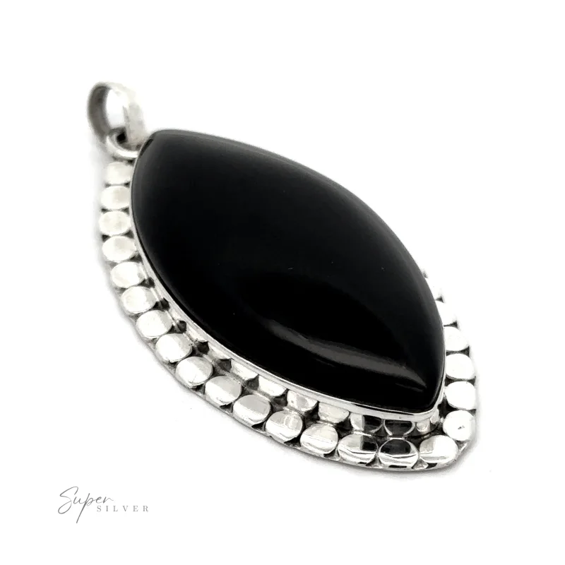 Statement Onyx Pendant With a Textured Setting